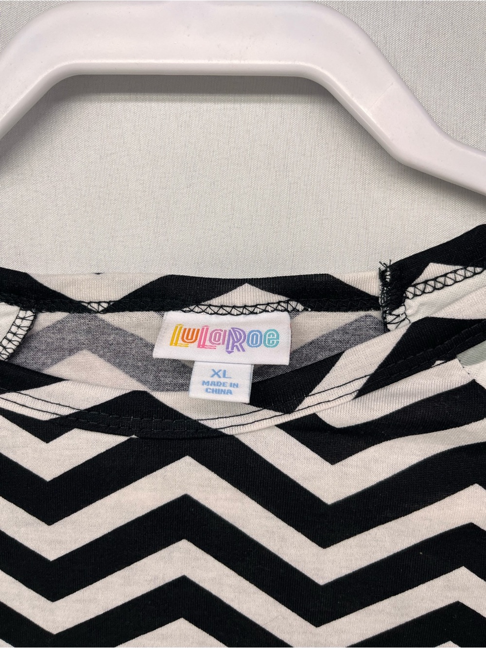 LuLaRoe Randy Black & White Chevron Raglan Tunic with Polka Dot Sleeves - Picture 2 of 6